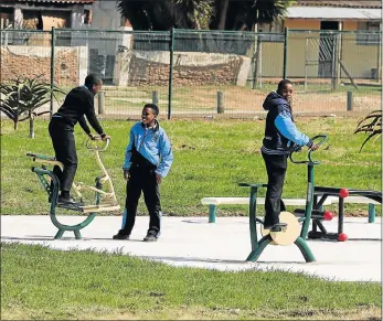  ?? Picture: WERNER HILLS ?? THEIR PLAYGROUND: Youngsters amuse themselves in KwaNobuhle’s Matanzima Street park