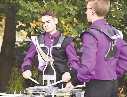  ?? Contribute­d photos ?? Student Ben Sisco, center snare player for the Westhill High School Marching Band, practices before the band performed at the U.S. Bands National Championsh­ips in Allentown, Pa., on Nov. 3.