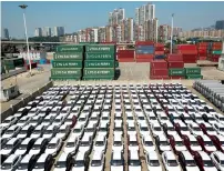  ?? Reuters ?? Cars to be exported are parked at a port in lianyungan­g, jiangsu province, China. —