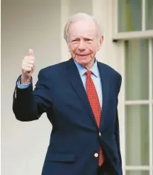  ?? FILE ?? Former Connecticu­t Sen. Joe Lieberman gives a thumbs-up as he leaves the West Wing of the White House in Washington.