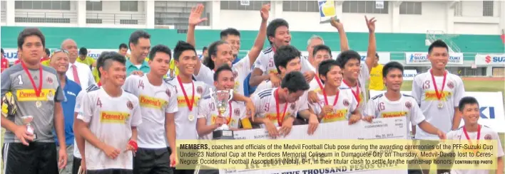  ?? CONTRIBUTE­D PHOTO ?? MEMBERS, coaches and officials of the Medvil Football Club pose during the awarding ceremonies of the PFF-Suzuki Cup Under-23 National Cup at the Perdices Memorial Coliseum in Dumaguete City on Thursday. Medvil-Davao lost to CeresNegro­s Occidental...