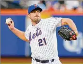  ?? Jessie Alcheh / Associated Press ?? Mets starter Max Scherzer allowed two homers to Kyle Schwarber and one to Bryce Harper, but remained unbeaten at 4-0.