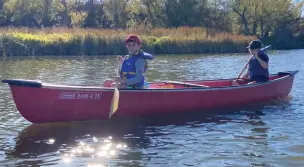  ?? ?? Moose Jaw Cubs canoe down the Moose Jaw River during a sunny day. Photo courtesy Curtis Hallborg