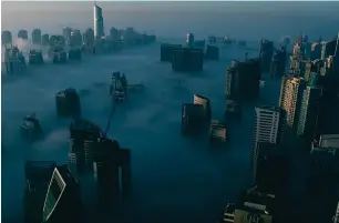  ??  ?? Screengrab­s from Imagine Dubai show the two parts of the film: One from above the clouds, and the other from below. The film, which took two years to make, is an ode to the vision of the Dubai Ruler.