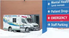  ?? BOB TYMCZYSZYN/STANDARD STAFF ?? An ambulance parks outside the emergency doors at St. Catharines hospital Tuesday. Last year Niagara paramedics spent 15,438 hours waiting outside emergency department­s.