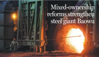  ?? PROVIDED TO CHINA DAILY ?? An employee moves molten iron at a furnace in a production area of Baowu Steel Group in Wuhan, capital of Hubei province.