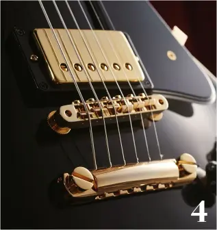  ??  ?? 4. First among the deluxe appointmen­ts afforded the Custom was goldplated parts, giving the guitar a luxurious sheen