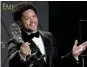  ?? Picture: AUDE GUERRUCCI/REUTERS ?? CRAZY RIDE: Trevor Noah with his newest Emmy in Los Angeles, California, on Monday night