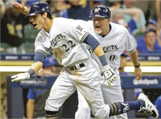  ?? AP ?? The Brewers’ Christian Yelich entered Friday atop the NL in hitting and homers and wasn’t far off the RBI lead. “I wish he was still a Marlin,” Cubs skipper Joe Maddon said.