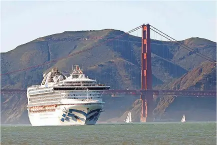  ?? SCOTT STRAZZANTE/SAN FRANCISCO CHRONICLE VIA AP ?? The Grand Princess cruise ship passes the Golden Gate Bridge on Feb. 11.