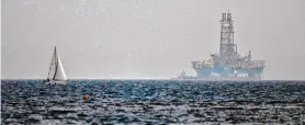  ?? Petros Karadjias/Associated Press 2020 ?? A drilling rig stands off Limassol, Cyprus. Chevron is planning to develop a sizable natural gas deposit off the island nation’s southern coastline.