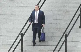  ??  ?? WASHINGTON: In this July 21, 2017, file photo, former White House press secretary Sean Spicer walks down the steps of the Eisenhower Executive Office Building towards the White House. —AP