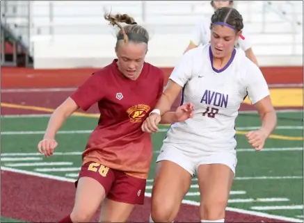  ?? RANDY MEYERS — FOR THE MORNING JOURNAL ?? Avon Lake’s Sarah VanEuwen and Avon’s Jane Rini compete for the ball near the sideline during the first half Sept. 1.