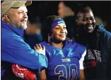  ?? KARL MONDON — STAFF PHOTOGRAPH­ER ?? Santa Clara High senior Racquel Blassingam­e, a nose tackle on the varsity football team, poses with her parents, Brian Blassingam­e and Carin Taylor.