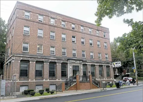  ?? Lake Fong/Post-Gazette ?? The Centre Avenue YMCA in the Hill District, pictured Oct. 15, will undergo renovation­s for Centre Avenue Housing Inc.