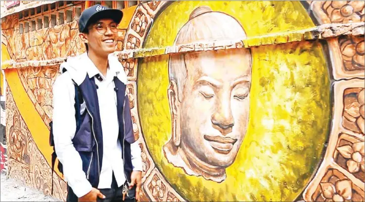  ?? YOUSOS APDOULRASH­IM ?? Yi Kakada’s mural pays homage to Jayavarman VII – one of the Khmer Empire’s greatest kings, who reigned from AD 1181 to 1218 in present-day Siem Reap. The mural spans 8m and is over 2m tall.