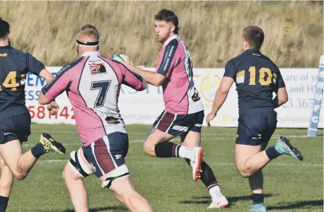  ?? ?? Winger James Long scored a try as Scarboroug­h RUFC claimed a 28-5 home win against Old Crossleyan­s PHOTO BY PAUL TAIT