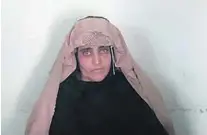  ?? AFP ?? Sharbat Gula photograph­ed by Pakistani authoritie­s in Peshawar before a court hearing.