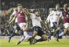  ??  ?? LONDON: Aston Villa’s James Chester, left, shoots but is blocked by Tottenham’s Cameron Carter-Vickers during the English FA Cup third round match between Tottenham Hotspur and Aston Villa at White Hart Lane in London, yesterday. —AP