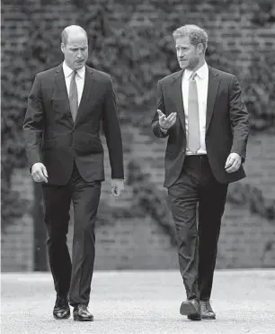  ?? Yui Muk/Associated Press ?? Britain’s Prince Harry, right, shares details of his contentiou­s relationsh­ip with his brother, Prince William, as well as other members of the royal family.