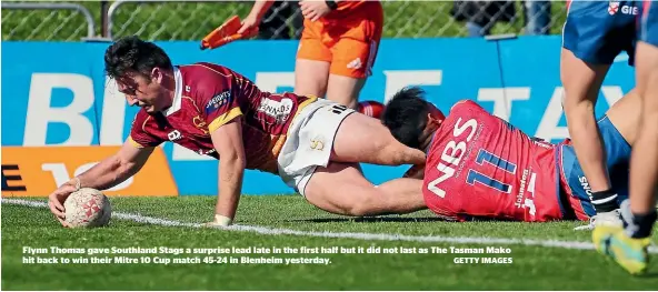  ??  ?? Flynn Thomas gave Southland Stags a surprise lead late in the first half but it did not last as The Tasman Mako hit back to win their Mitre 10 Cup match 45-24 in Blenheim yesterday. GETTY IMAGES