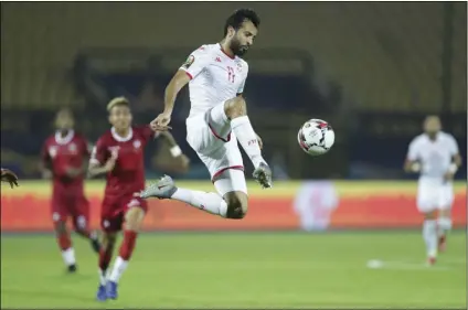  ?? PHOTO/HASSAN AMMAR ?? Tunisia’s Taha Khenissi controls the ball during the African Cup of Nations quarterfin­al soccer match between Madagascar and Tunisia in Al Salam stadium in Cairo, Egypt, on Thursday. AP