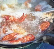  ?? ARIEL COBBERT/THE COMMERCIAL APPEAL ?? Crawfish being prepared at the new Red Hook Cajun Seafood & Bar location in Memphis on New Brunswick road on Tuesday,
March 10, 2020.