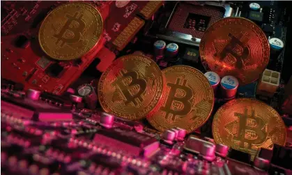  ?? ?? The production of cryptocurr­ency is an enormously energy-intensive process. Photograph: Dado Ruvić/Reuters