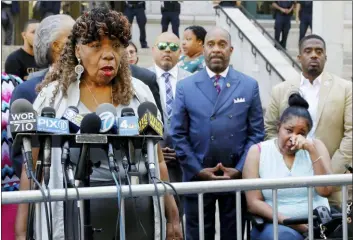  ?? RICHARD DREW — THE ASSOCIATED PRESS ?? Gwen Carr, mother of chokehold victim Eric Garner, left, speaks outside the U.S. Attorney’s office, in the Brooklyn borough of New York, as Garner’s widow Esaw Snipes listens at right, Tuesday. Federal prosecutor­s won’t bring civil rights charges against New York City police officer Daniel Pantaleo, in the 2014 chokehold death of Garner, a decision made by Attorney General William Barr and announced one day before the five-year anniversar­y of his death, officials said.