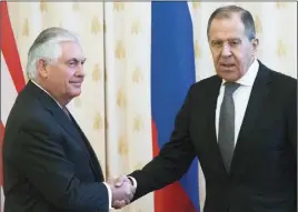  ?? AP PHOTO ?? U.S. Secretary of State Rex Tillerson, left, and Russian Foreign Minister Sergey Lavrov shake hands prior to their talks in Moscow yesterday.