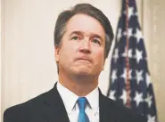  ?? Jim Watson, Getty Images ?? Brett Kavanaugh, 53, waits Monday before being sworn in as the 114th justice in U.S. Supreme Court history. The ceremony was in the East Room of the White House.