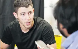  ?? DAN RIEDLHUBER ?? Nick Jonas, who gained fame with the Jonas Brothers, speaks about diabetes before his concert at Rexall Place in Edmonton Friday. He says meeting fans with diabetes across the country has been an empowering experience.