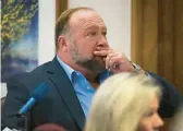  ?? BRIANA SANCHEZ/AUSTIN AMERICAN-STATESMAN ?? Infowars host Alex Jones testified Wednesday that it was irresponsi­ble to call the 2012 Sandy Hook school massacre a hoax.