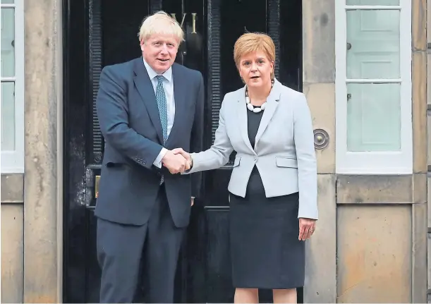  ??  ?? PROBE: Prime Minister Boris Johnson with First Minister Nicola Sturgeon at Bute House, Edinburgh, for a meeting between the two leaders in July 2019.