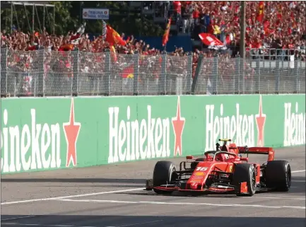  ??  ?? Ferrari’s Charles Leclerc crosses the finish line to seal a second grand prix victory in as many weeks