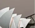  ?? Foto: dpa ?? Wetterkapr­iolen in Sydney: ein Sandsturm über dem Opernhaus.