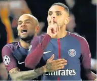  ??  ?? QUIET A FEAT Kurzawa hails his hat-trick with Dani Alves