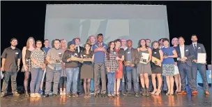  ??  ?? n HONOURS: The students at the awards night; (left) Zanib Shahid with hurdler Julz Adeniran