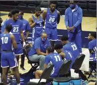  ?? David Butler II / USA Today ?? Central Connecticu­t State coach Donyell Marshall talks to his team during a timeout against UConn in a 2020 game.