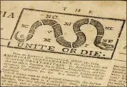  ?? MATT ROURKE — THE ASSOCIATED PRESS ?? This photo shows a detail of a Pennsylvan­ia Journal and the Weekly Advertiser at the Goodwill Industries in Bellmawr, N.J., Thursday. A quick eye by Goodwill workers in southern New Jersey turned up the original 1774 Philadelph­ia newspaper with an iconic “Unite or Die” masthead.
