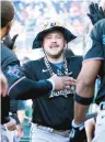  ?? NICK WASS/AP ?? Miami’s Jake Burger celebrates his home run in the third inning against the Nationals on Saturday in Washington.