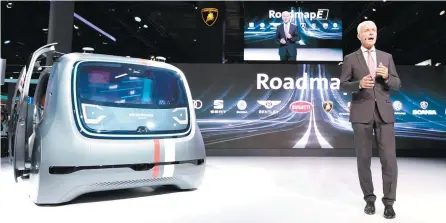  ?? AFP-Yonhap ?? Volkswagen CEO Matthias Mueller presents Sedric, the group’s first autonomous car prototype, during a preview night for the media on the eve of IAA motor show in Frankfurt, Monday.