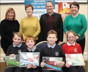  ?? Photos by Sheila Fitzgerald. ?? Boherbue NS pupils Andrew Duane, Ciaran Aherne, Eoghan Aherne and Tara Hartnett were second in the U-11 category.