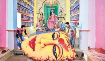  ?? PTI ?? A Durga Puja pandal with the theme of 'violence against women' in Kolkata on Monday.