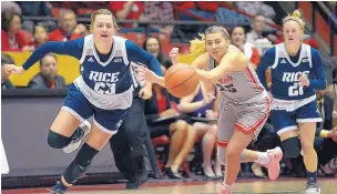  ??  ?? UNM’s Laneah Bryan, center, makes a steal against Rice as Alexah Chrisman, left, and Gabrielle Stanton pursue.