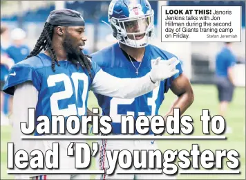  ?? Stefan Jeremiah ?? LOOK AT THIS! Janoris Jenkins talks with Jon Hillman during the second day of Giants traning camp on Friday.