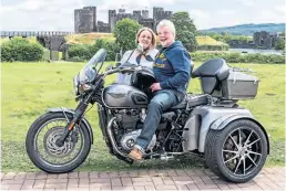  ??  ?? Simon Weston with his wife, Lucy. He says he hasn’t been able to tempt her on to the pillion seat yet! [Photo by Tony Smith]