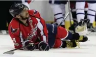  ?? ROB CARR/GETTY IMAGES ?? Alex Ovechkin needed medical help and missed part of Game 5 against the Leafs after a hard hit.