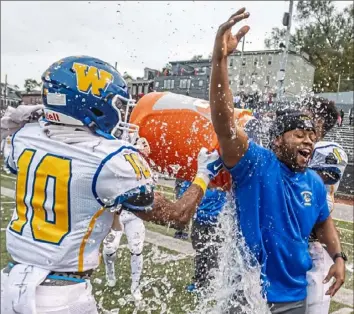  ?? Steph Chambers/ Post- Gazette ?? Westinghou­se coach Donta Green and his Bulldogs celebrated a City League championsh­ip last season, Westinghou­se's first title in 23 years.