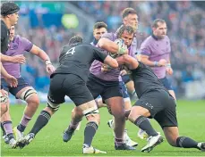  ?? ?? Top: Mark Telea of New Zealand is tackled by Scotland’s Duhan van der Merwe. Above: Pierre Schoeman is closed down by Sam Whitelock and Scott Barrett.